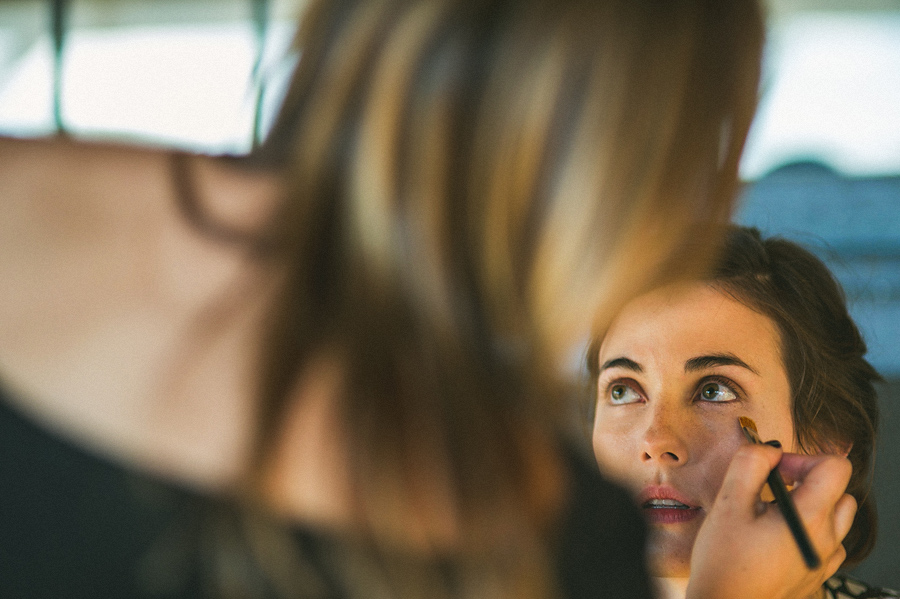 bride getting makeup