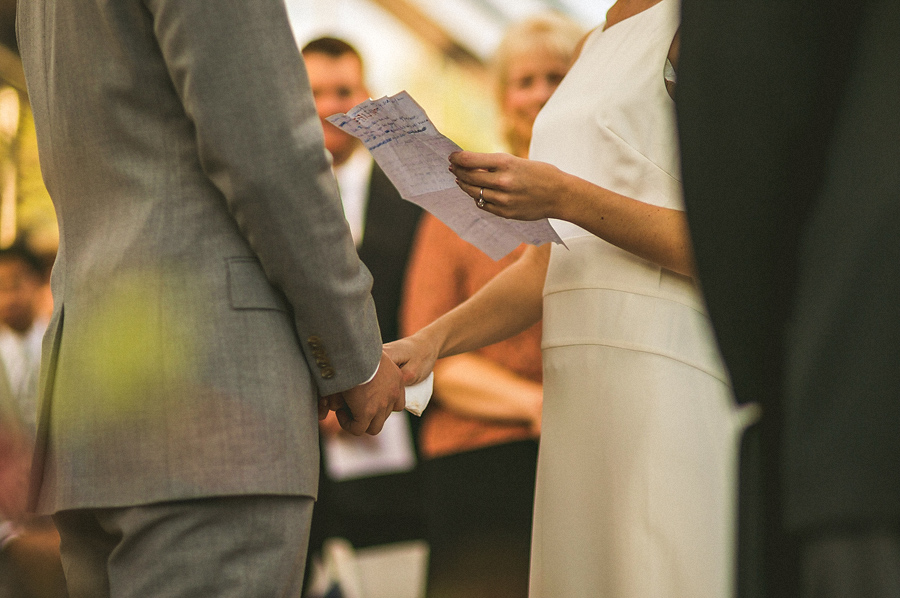 couple reading wedding vows