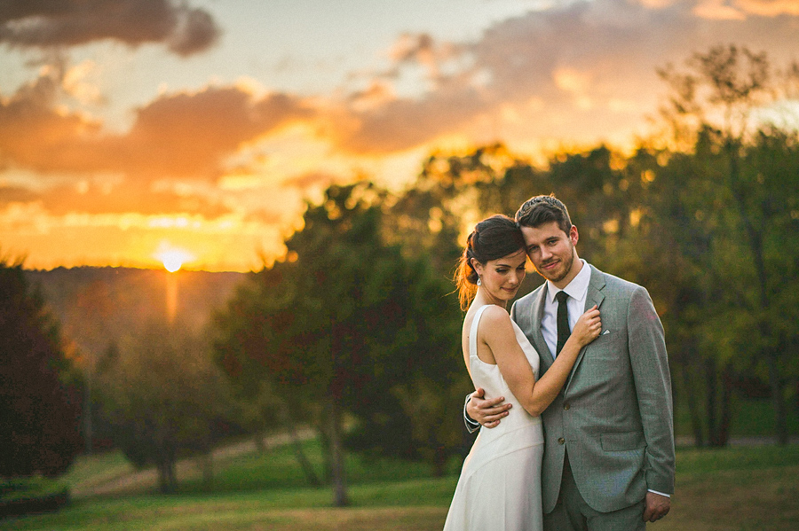 bride and groom at sunset